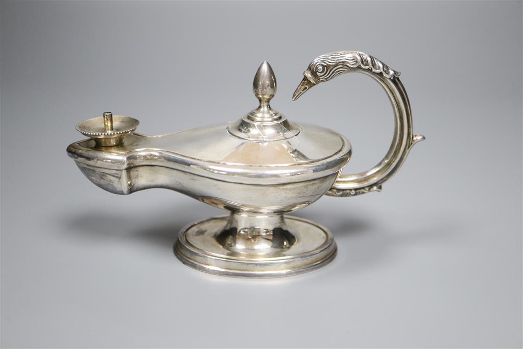 A late Victorian silver Aladdins Lamp cigar table lighter, A & J Zimmerman, Birmingham, 1899, height 9.8cm, gross 4oz.